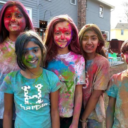 5 kids colored in Holi Powder